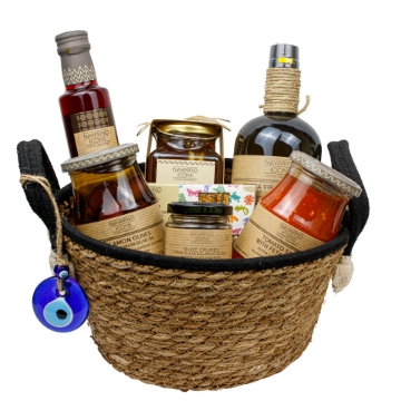 Explore Authentic Greek Flavors: Navarino Icons Premium Food Basket Navarino Icons Premium Greek Food Basket with olive oil, olives, honey, and other gourmet ingredients.