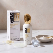 Mastic Spa Hyaluronic Velvet Eye Gel bottle on white marble, surrounded by natural mastic tears, donkey milk texture, and a molecular graphic of hyaluronic acid.